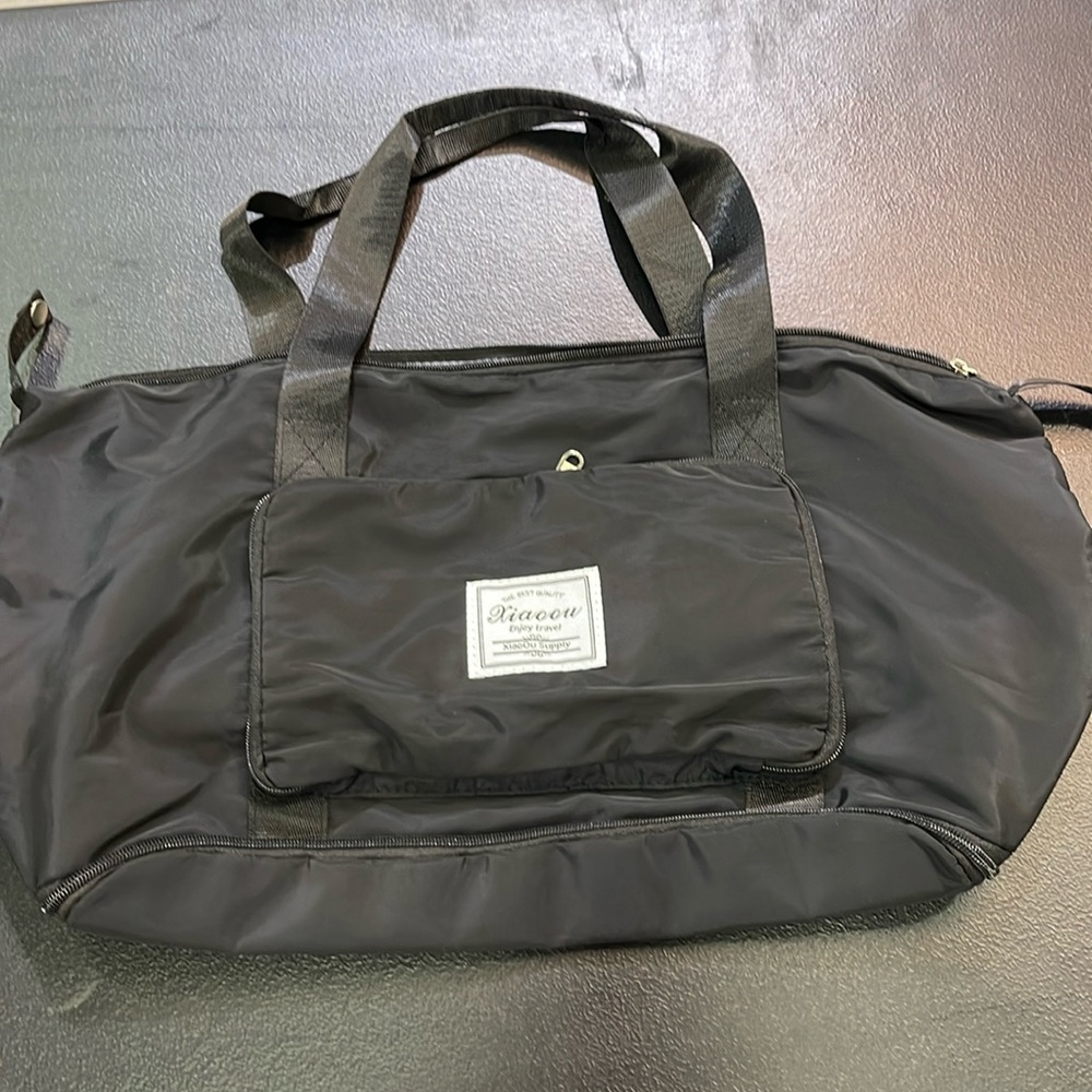 New without tags foldable travel duffel bag